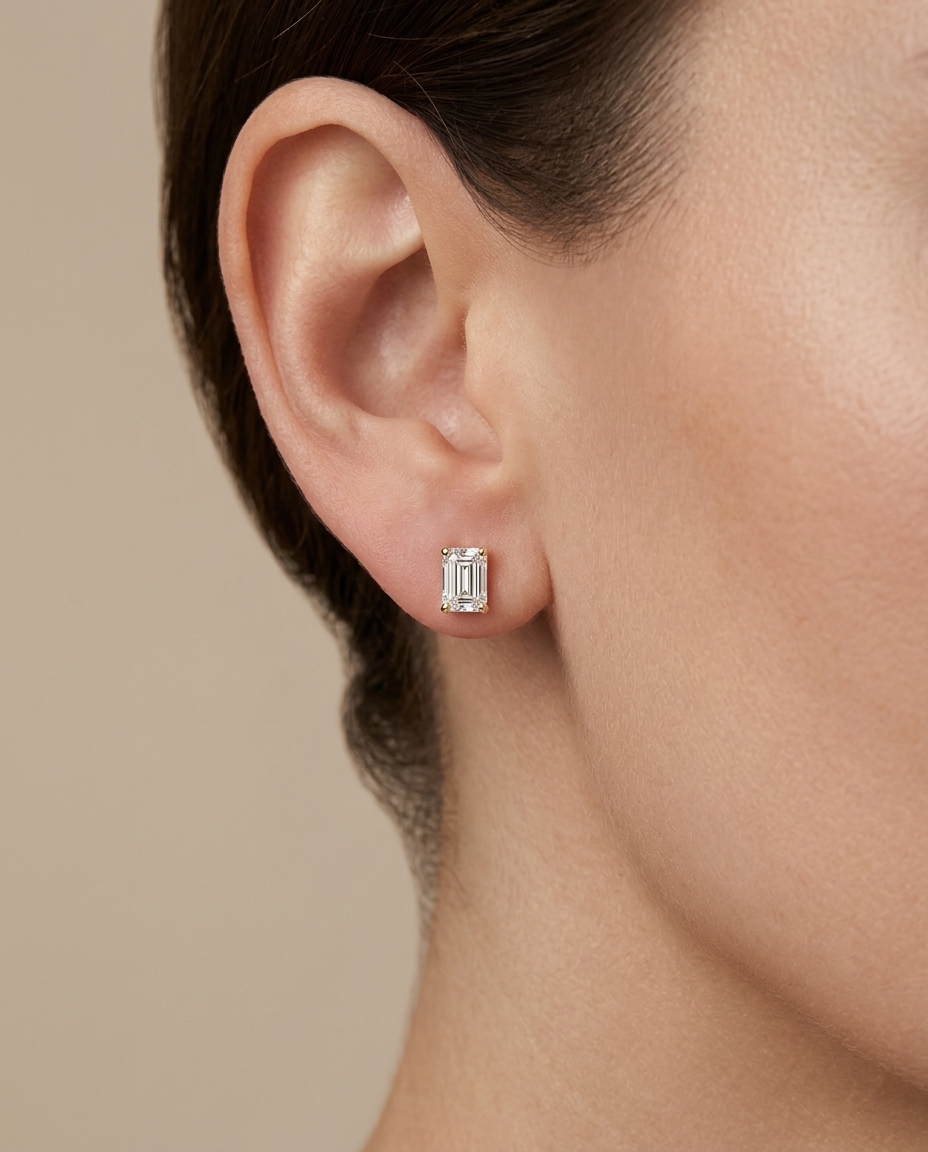 14KT Gold Emerald Cut Diamond Earring Studs on model