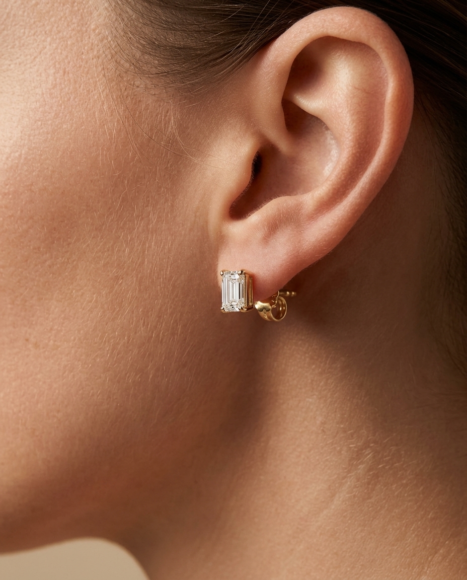 14KT Gold Emerald Cut Diamond Earring Studs on model