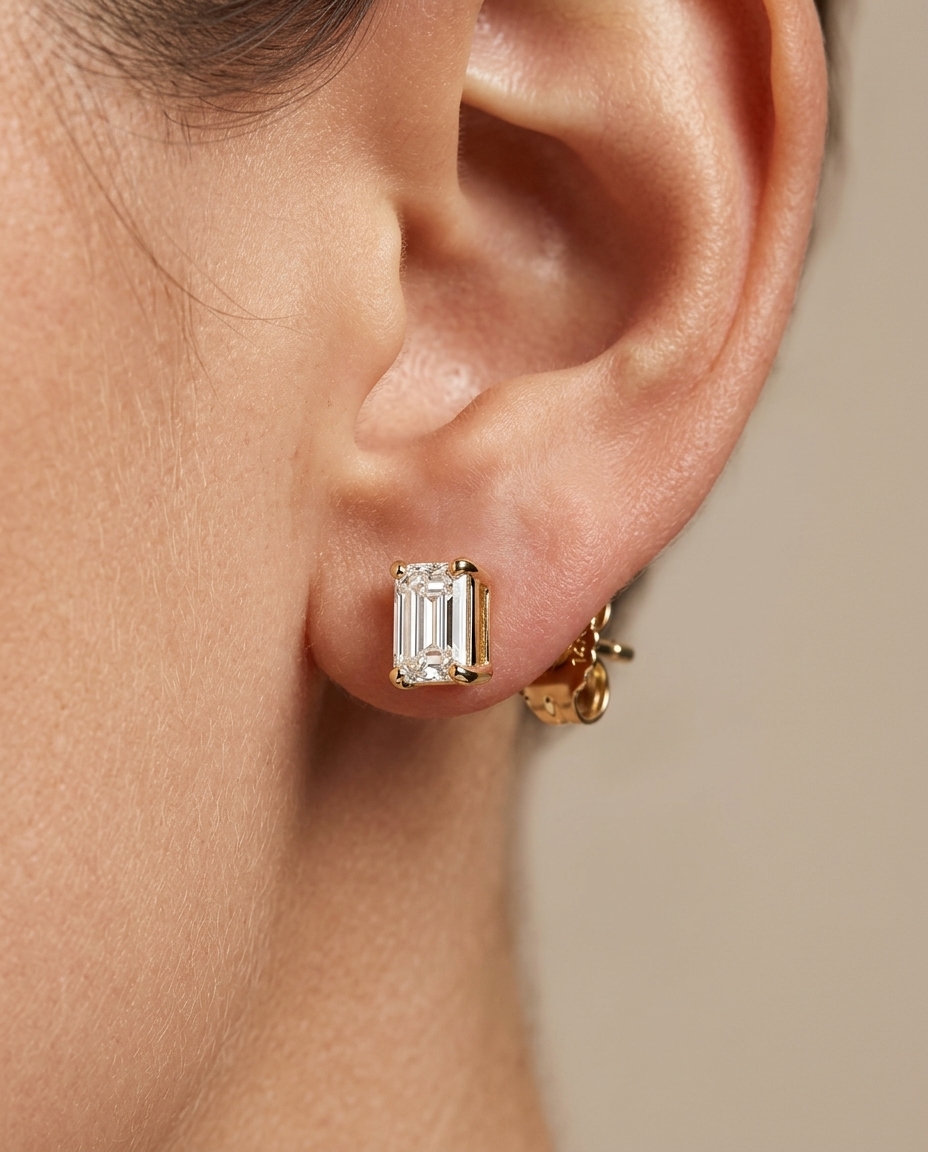 14KT Gold Emerald Cut Diamond Earring Studs on model
