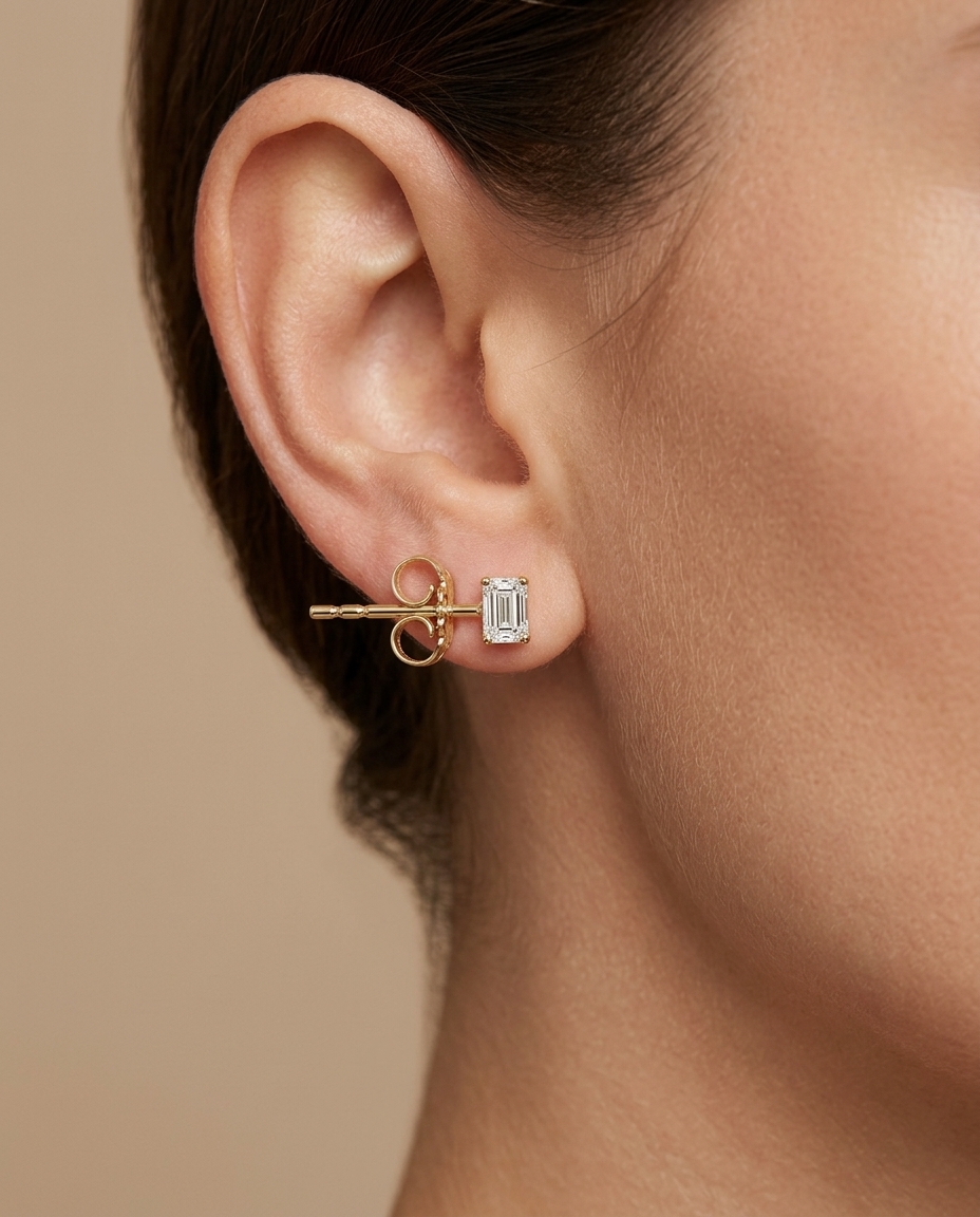 14KT Gold Emerald Cut Diamond Earring Studs on model