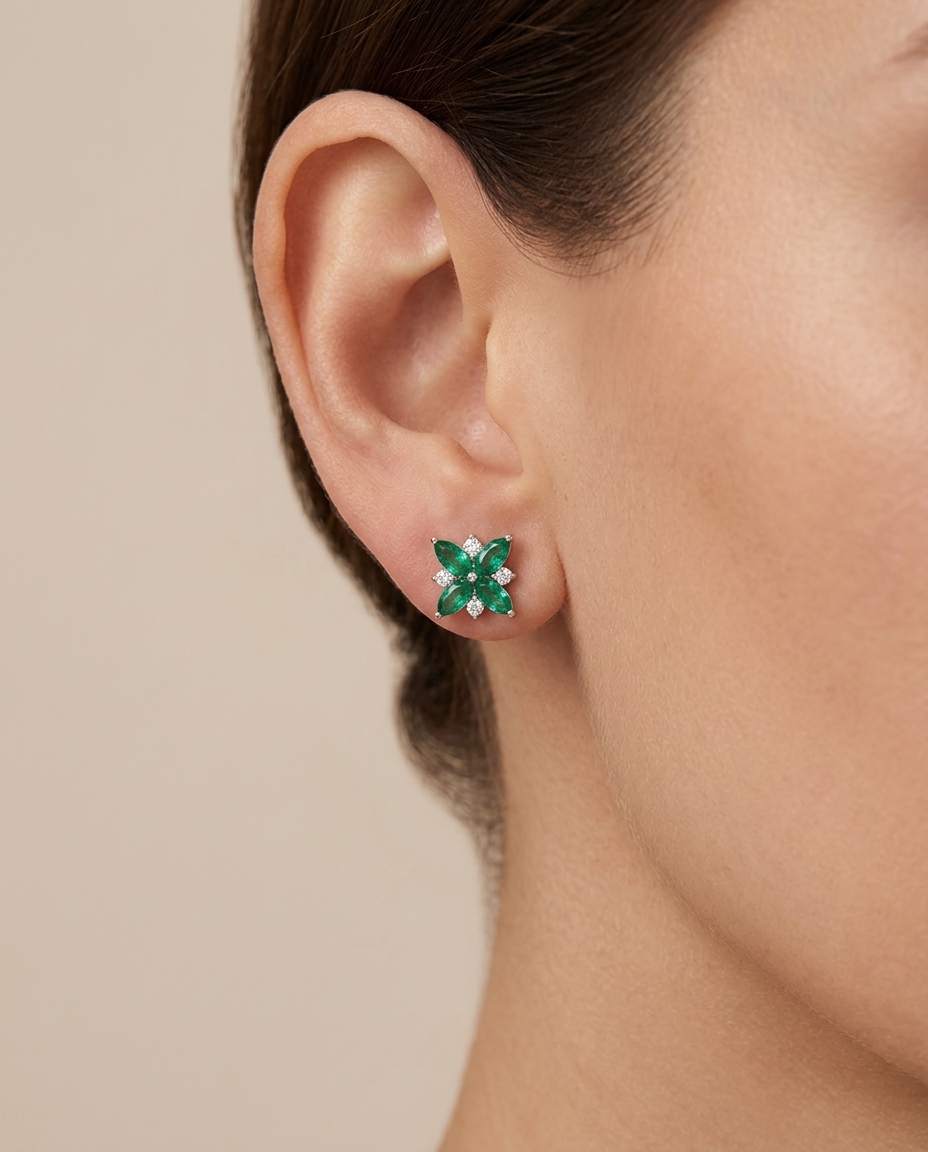 18KT White Gold Emerald and Diamond Earring on model
