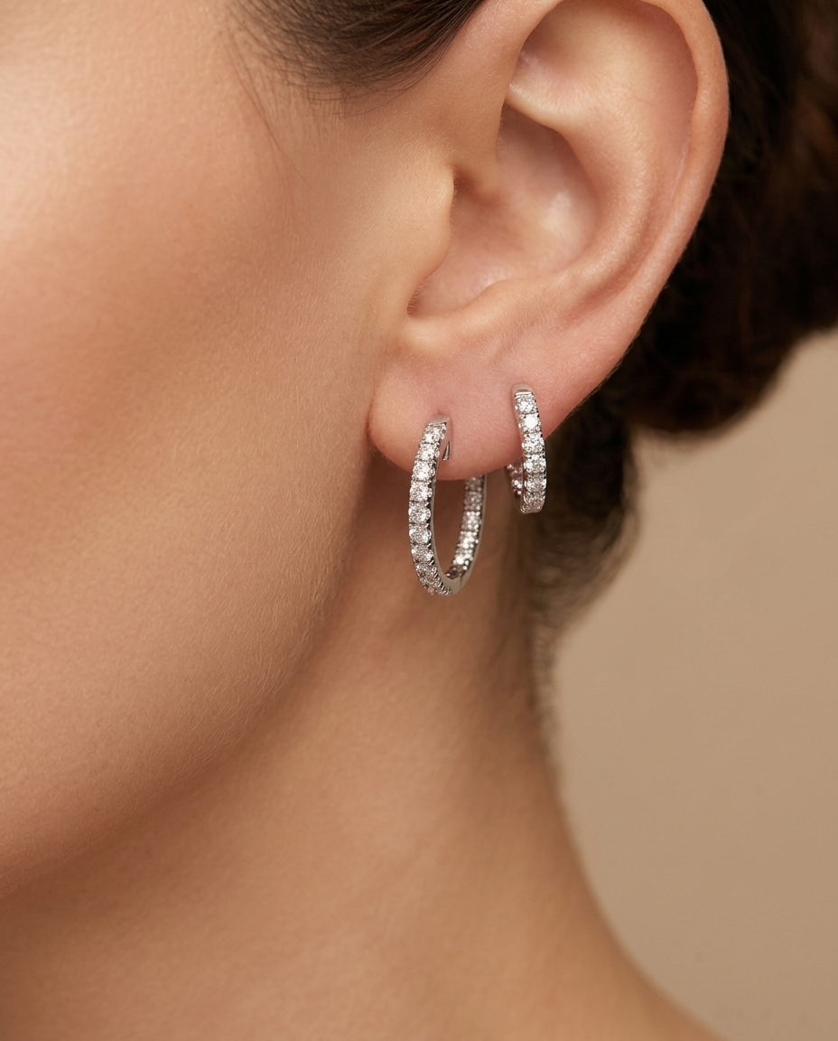 14KT White Gold Diamond Huggies Earrings on model