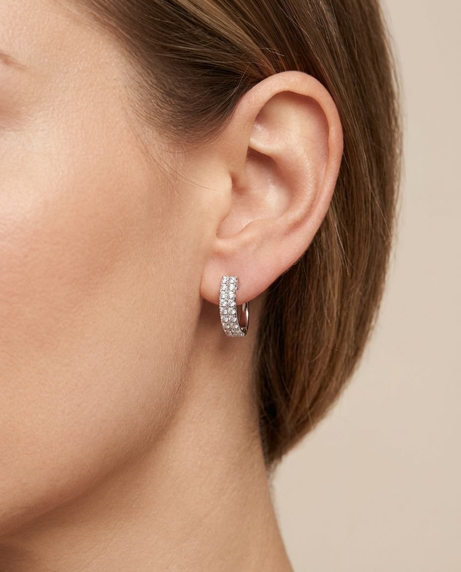 14KT White Gold Diamond Huggies on model
