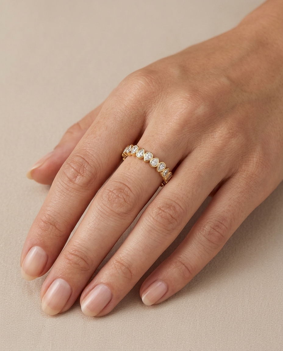 14KT Gold Pear Shape Bezeled Diamonds Eternity Ring on model
