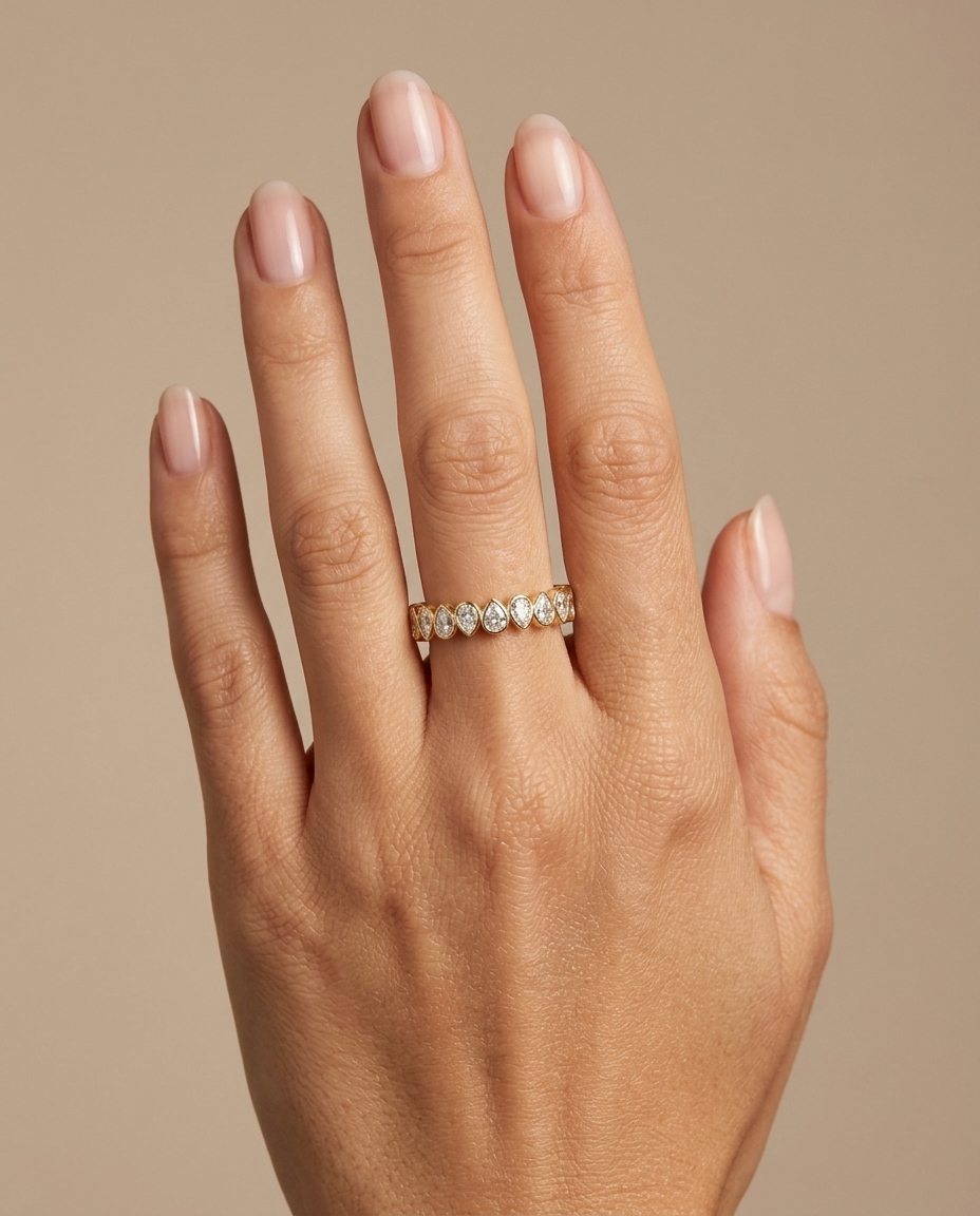 14KT Gold Pear Shape Bezeled Diamonds Eternity Ring on model