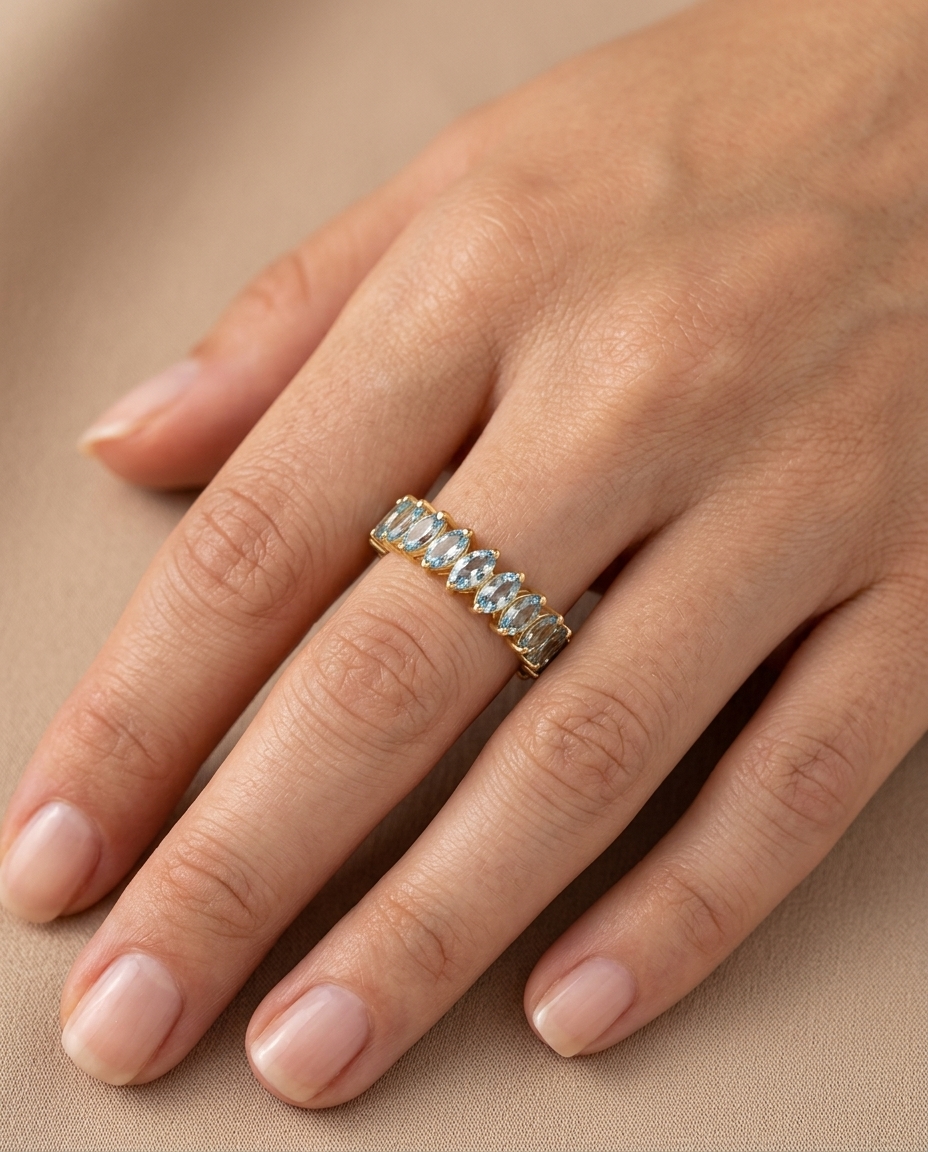 14KT Yellow Gold Marquise Shape Aquamarine Eternity Band on model
