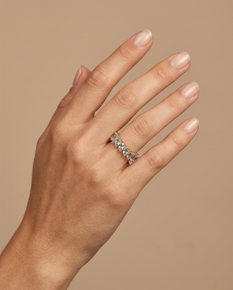 14KT Yellow Gold Marquise Shape Aquamarine Eternity Band on model