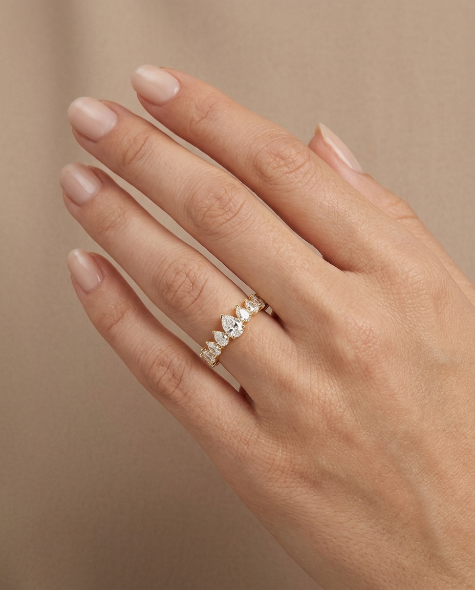 14KT Gold Ring with Pear Shape Diamonds on model