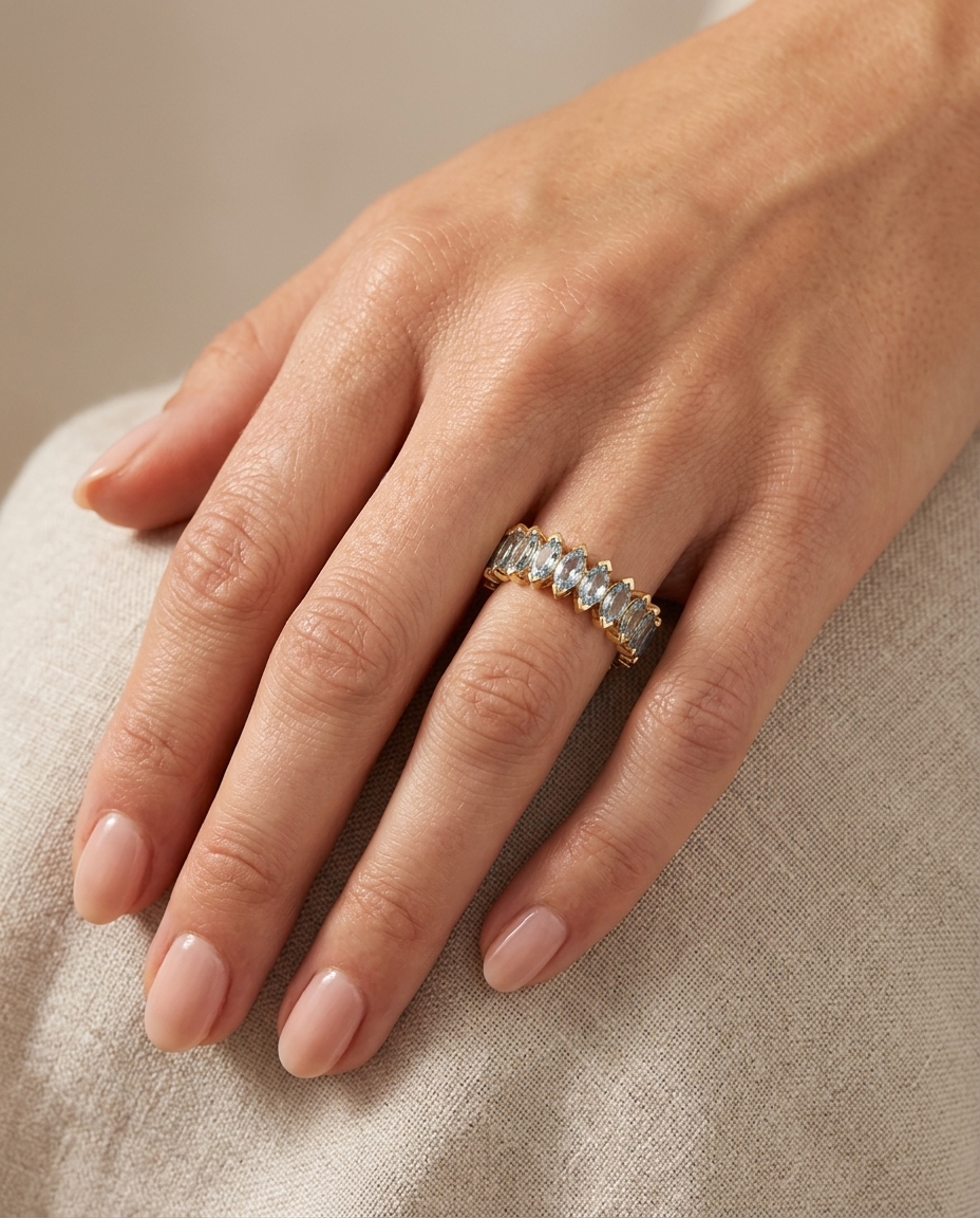 14KT Gold Marquise Shape Aquamarine Eternity Band on model