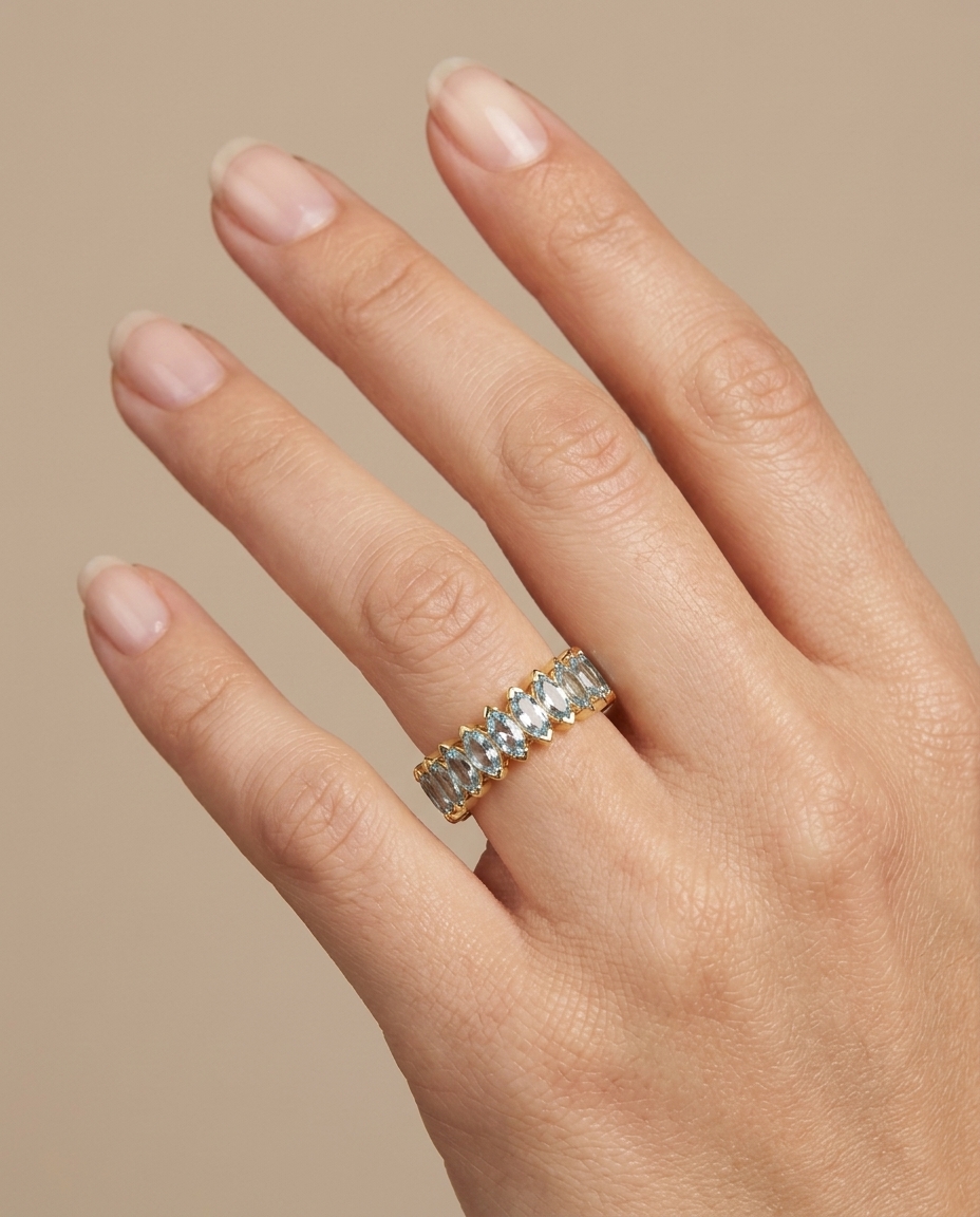14KT Gold Marquise Shape Aquamarine Eternity Band on model