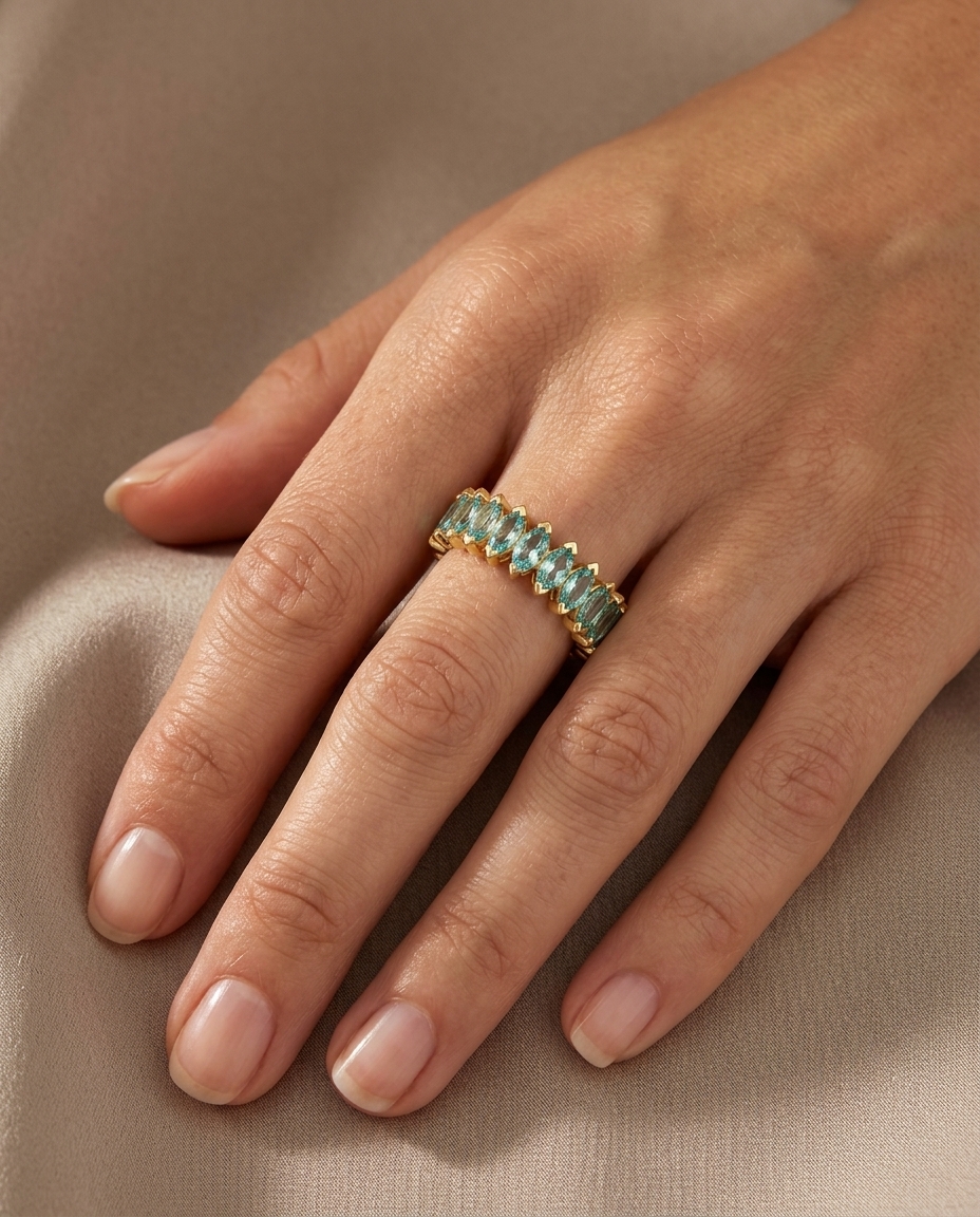 14KT Gold Marquise Shape Aquamarine Eternity Band on model