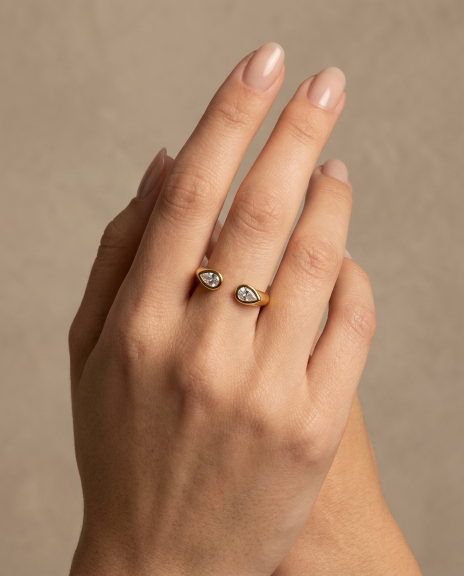 14KT Gold Pear Shape Diamond Open Ended Ring on model