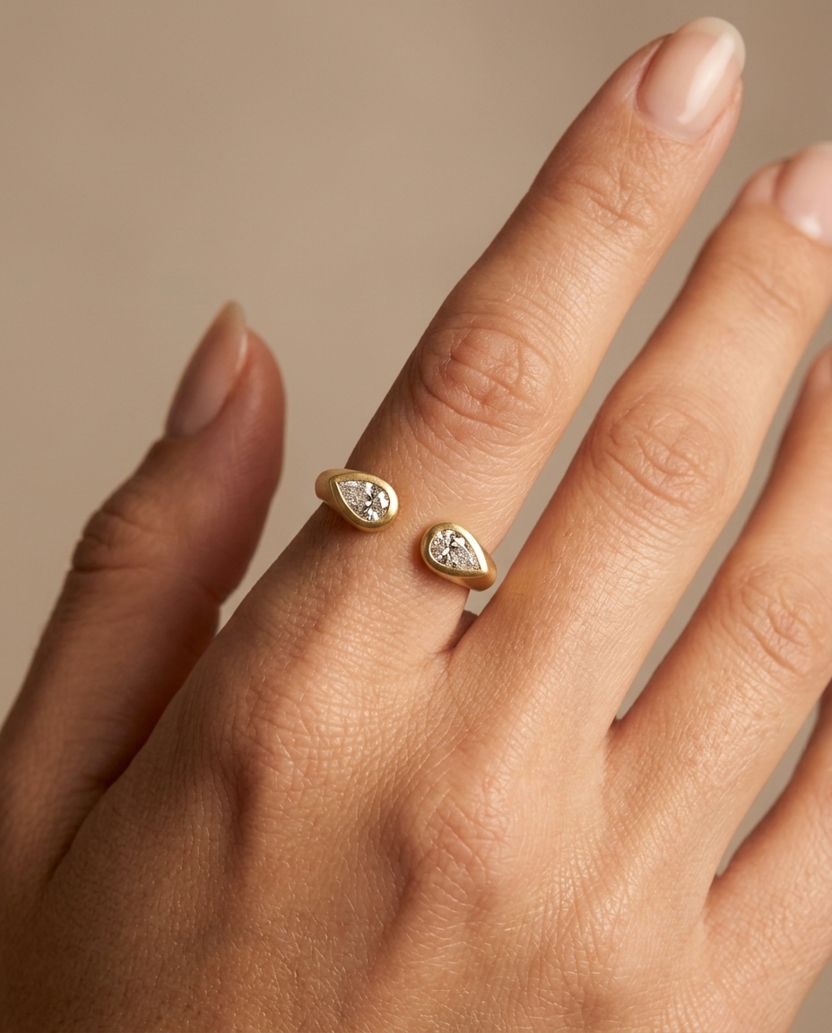 14KT Gold Pear Shape Diamond Open Ended Ring on model