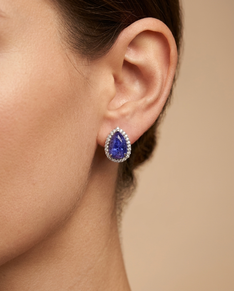 14KT White Gold Pear Shape Tanzanite and Diamond Ring on model
