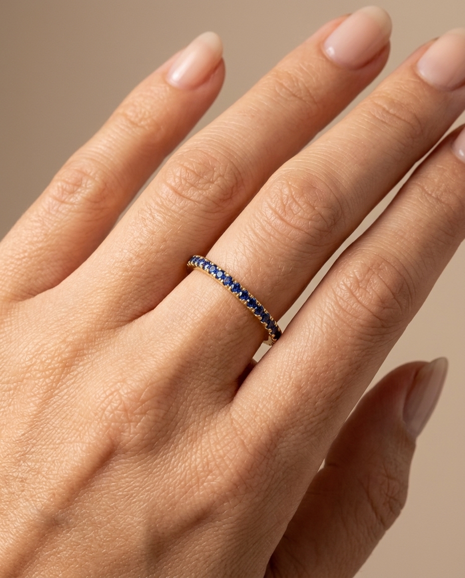 14KT Gold Blue Sapphire Ring Eternity Band on model