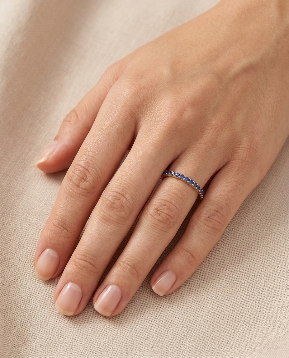 14KT Gold Full Eternity Blue Sapphire Thin Ring Band on model