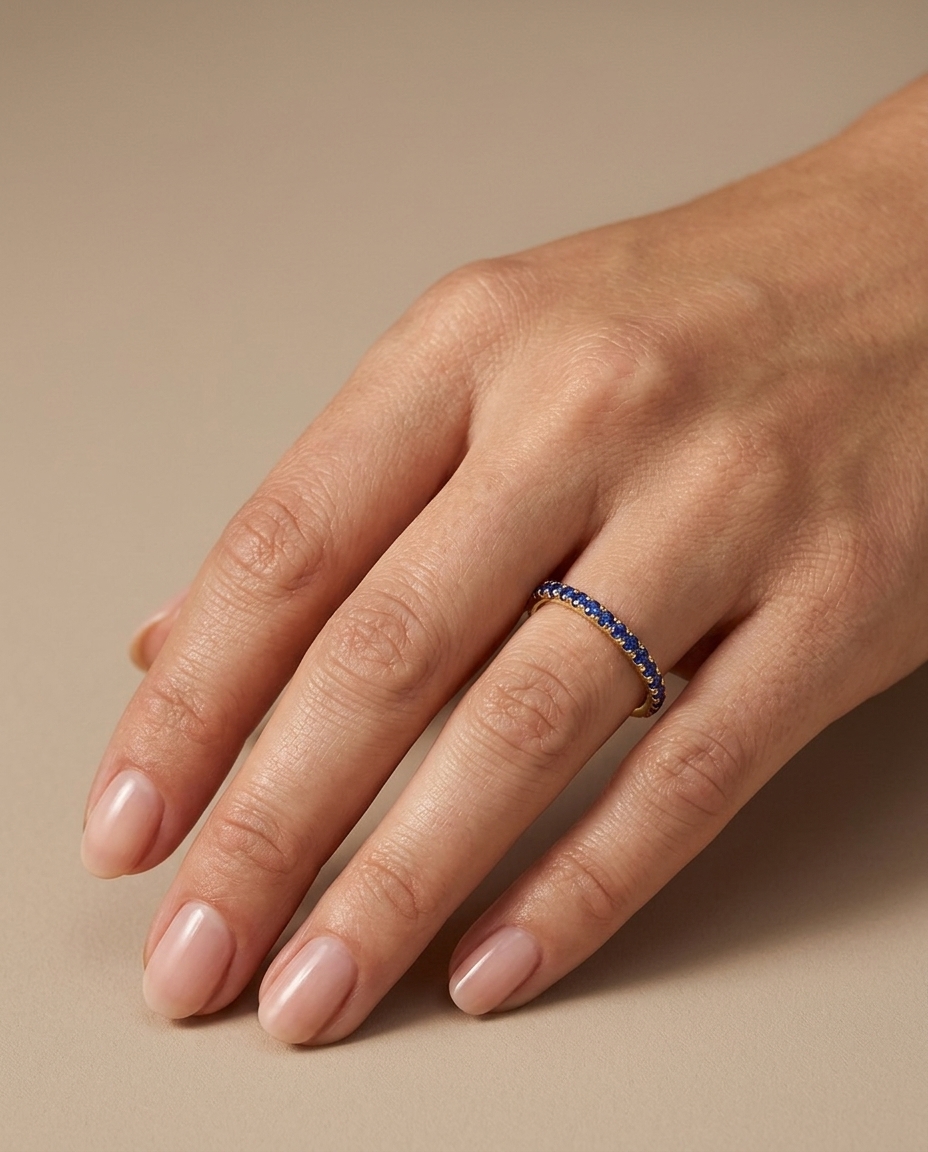 14KT Gold Full Eternity Blue Sapphire Thin Ring Band on model