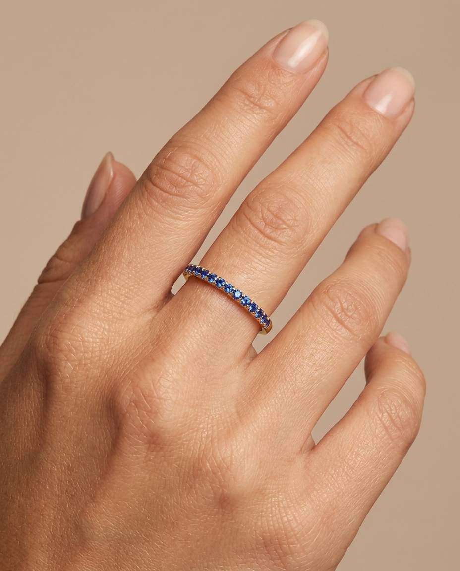 14KT Gold Full Eternity Blue Sapphire Thin Ring Band on model
