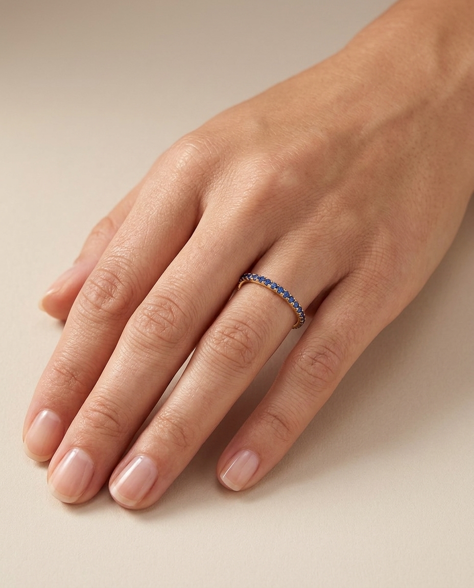 14KT Gold Full Eternity Blue Sapphire Thin Ring Band on model