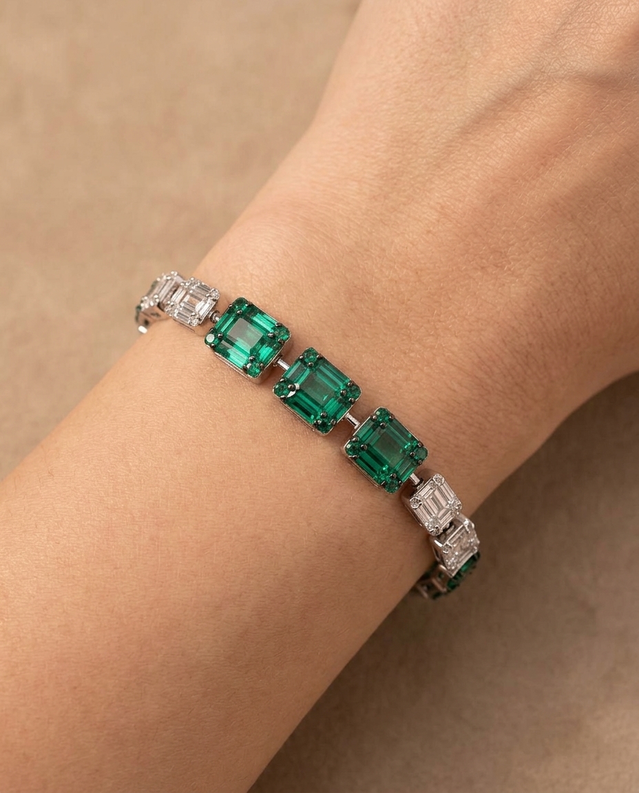 18KT White Gold Emerald & Diamond Baguette Bracelet on model
