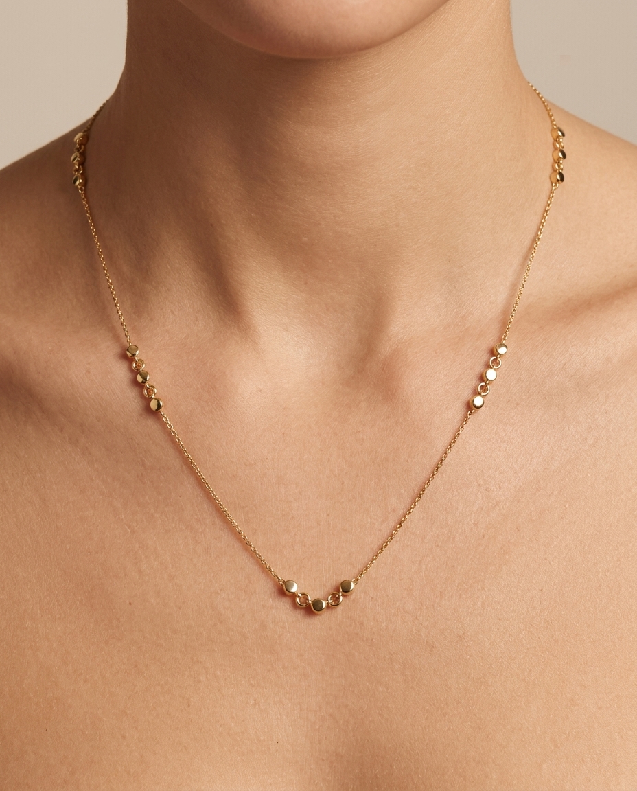 14KT Gold Station Necklace on model