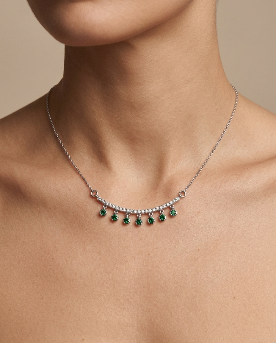 14KT Gold Diamond and Emerald Necklace on model