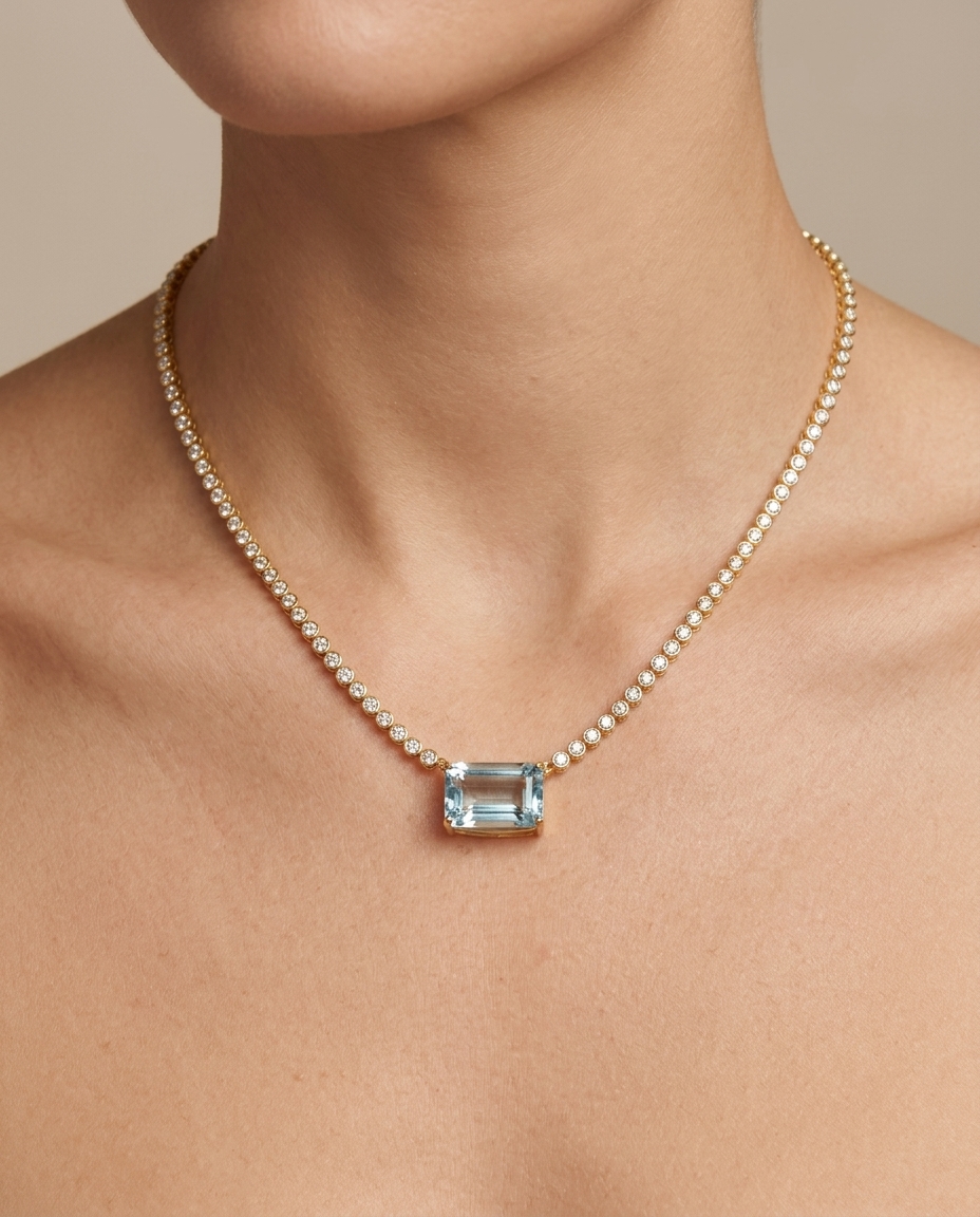 14KT Yellow Gold Aqaquamarine and Diamond Bezel Tennis Necklace on model