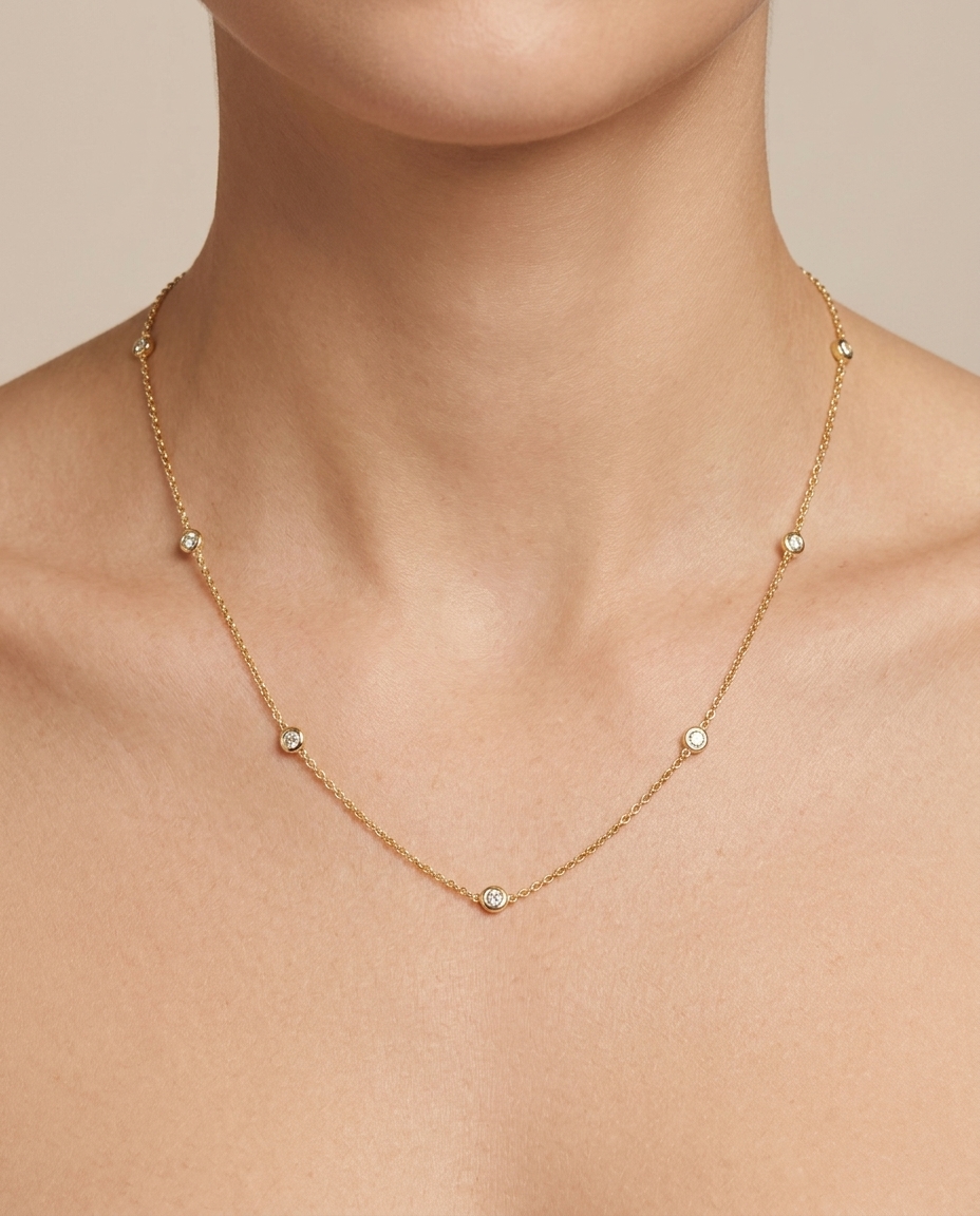 14KT Gold Bezelled Diamond Station Necklace on model