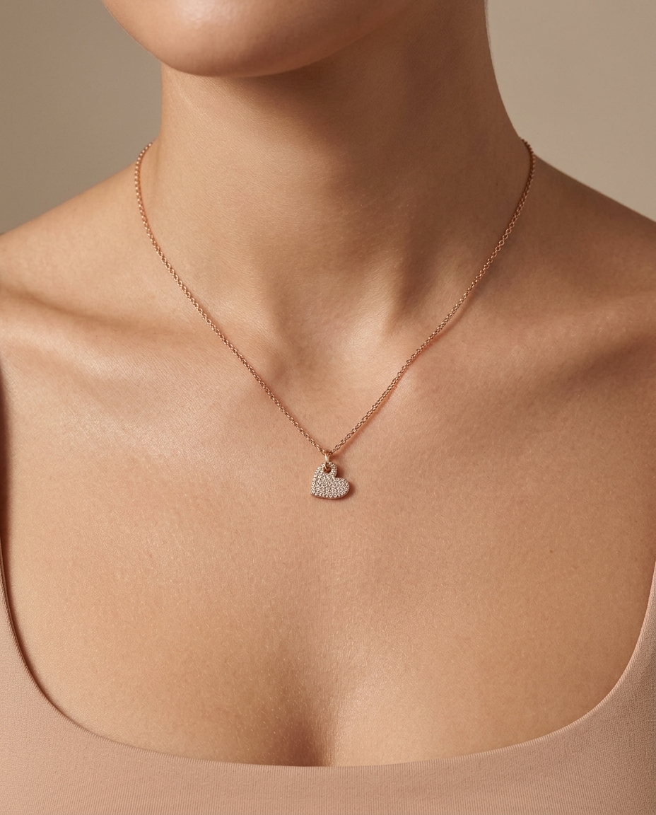 14KT Gold Heart Pendant with Diamonds on model