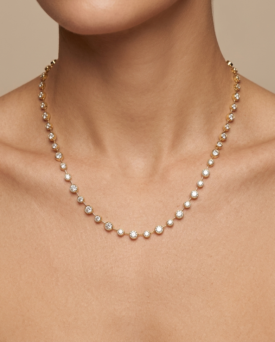 14KT Gold Station Diamond Bezel Tennis Necklace (5.50 CTS) on model