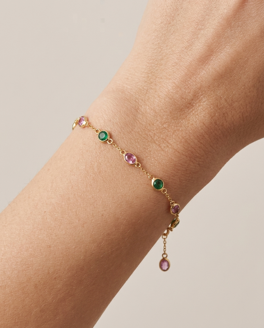 18KT Gold Emerald and Pink Sapphire Bracelet on model