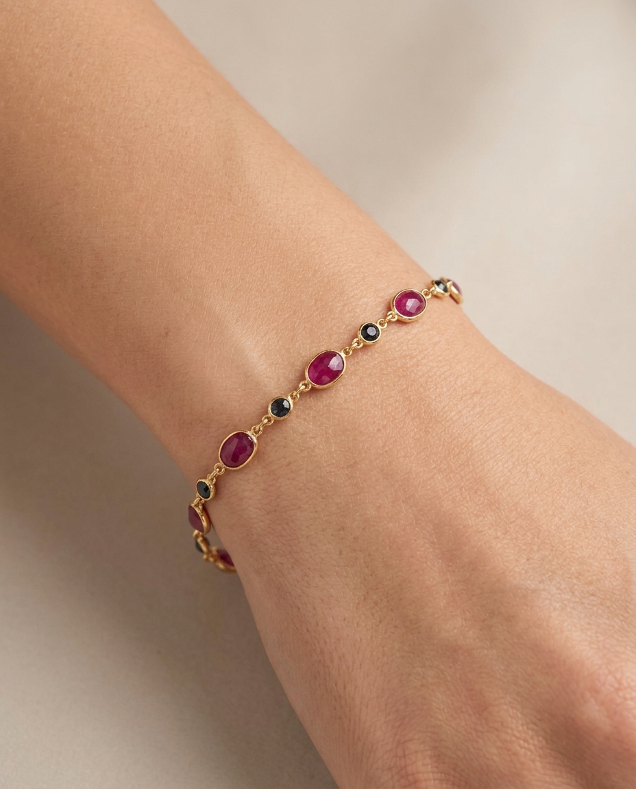 18KT Yellow Gold Ruby and Sapphire Station Bracelet on model