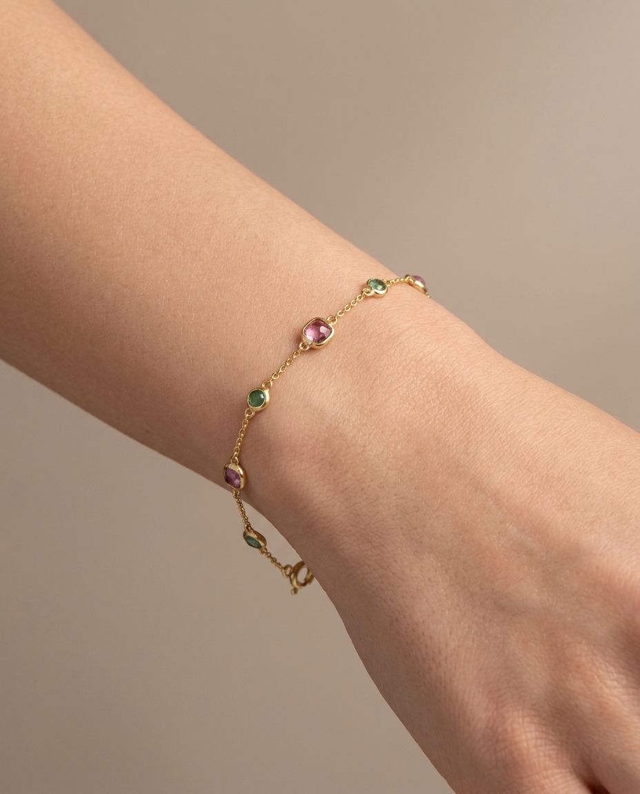 18KT Yellow Gold Emerald and Pink Sapphire Station Bracelet on model
