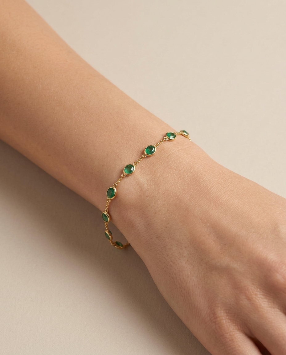 18KT Yellow Gold Emerald Station Bracelet on model