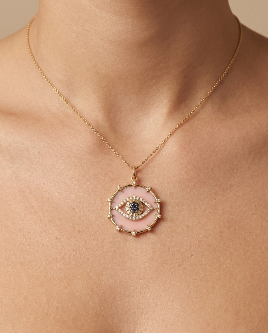 14KT Yellow Gold Pink Opal Evil Eye Pendant with Blue Sapphire and Diamonds on model