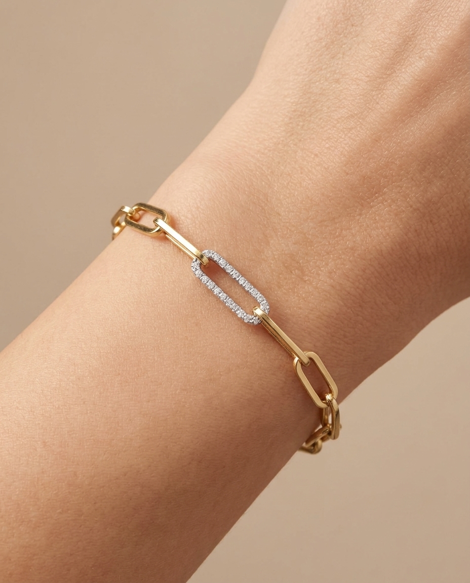 14KT Yellow Gold Hollow Paperclip Bracelet with Diamond Link on model