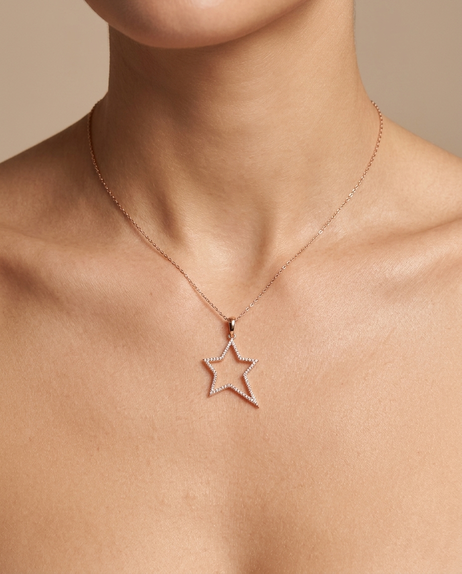 18KT Gold Star Pendant with Diamonds on model