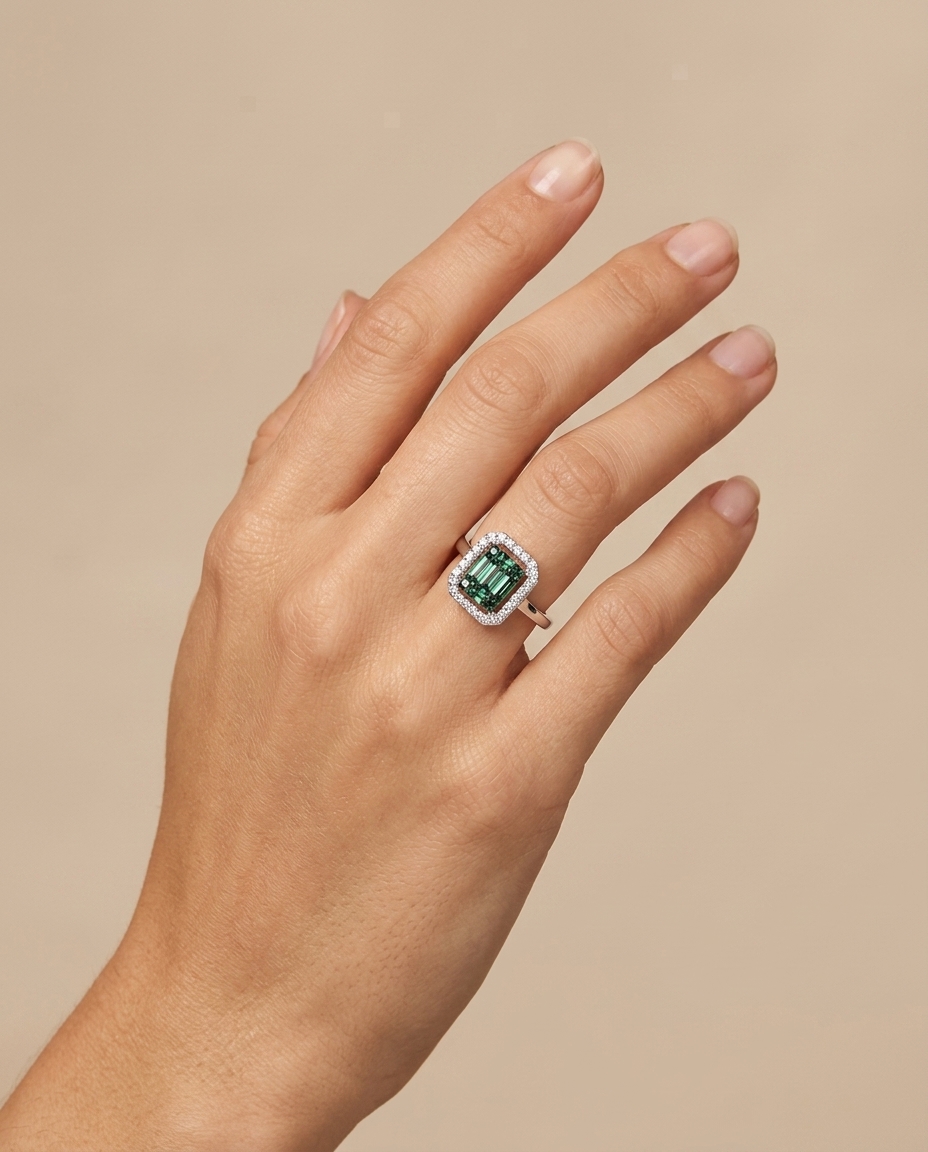 18KT White Gold Emerald and Diamonds Ring on model