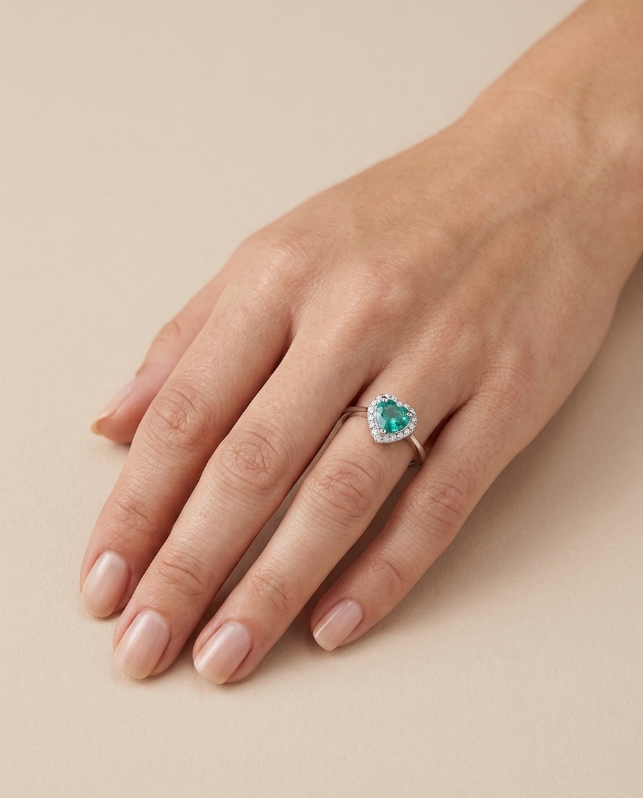 18KT White Gold Heart Shaped Emerald and Diamonds Ring on model
