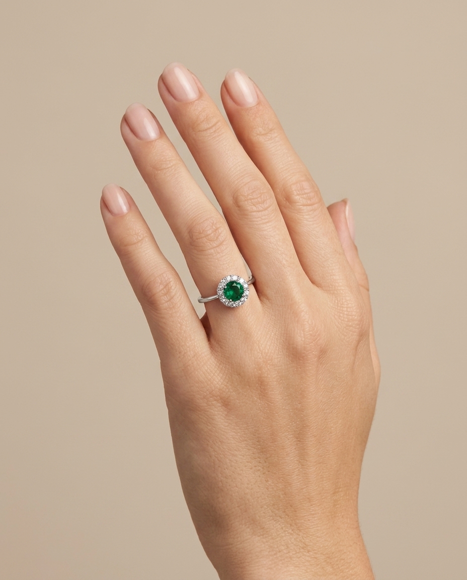 18KT White Gold Emerald and Diamonds Ring on model