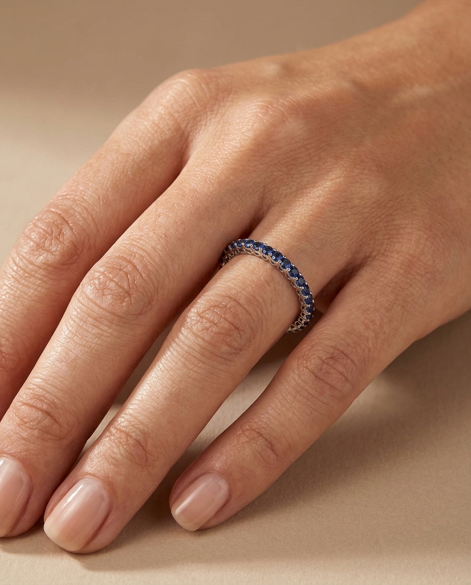 18KT Gold Full Eternity Blue Sapphire Ring Band on model