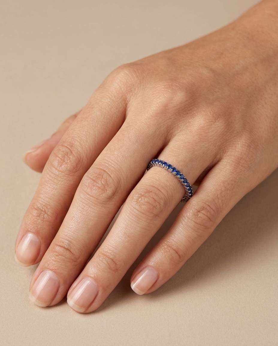 18KT Gold Full Eternity Blue Sapphire Ring Band on model