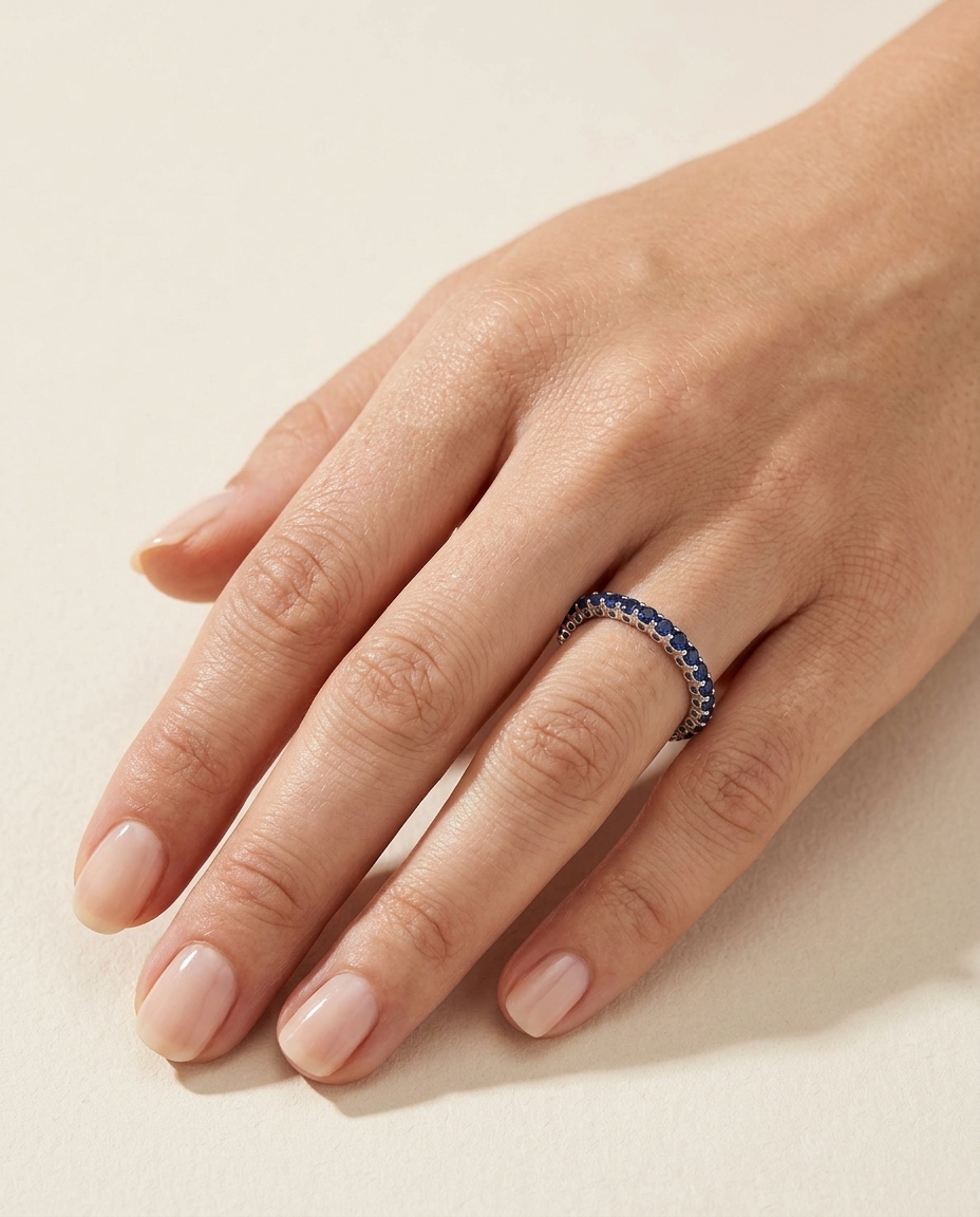 18KT Gold Full Eternity Blue Sapphire Ring Band on model
