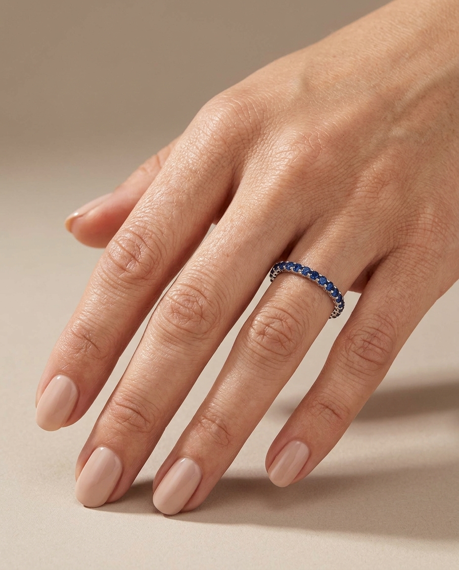 18KT Gold Full Eternity Blue Sapphire Ring Band on model