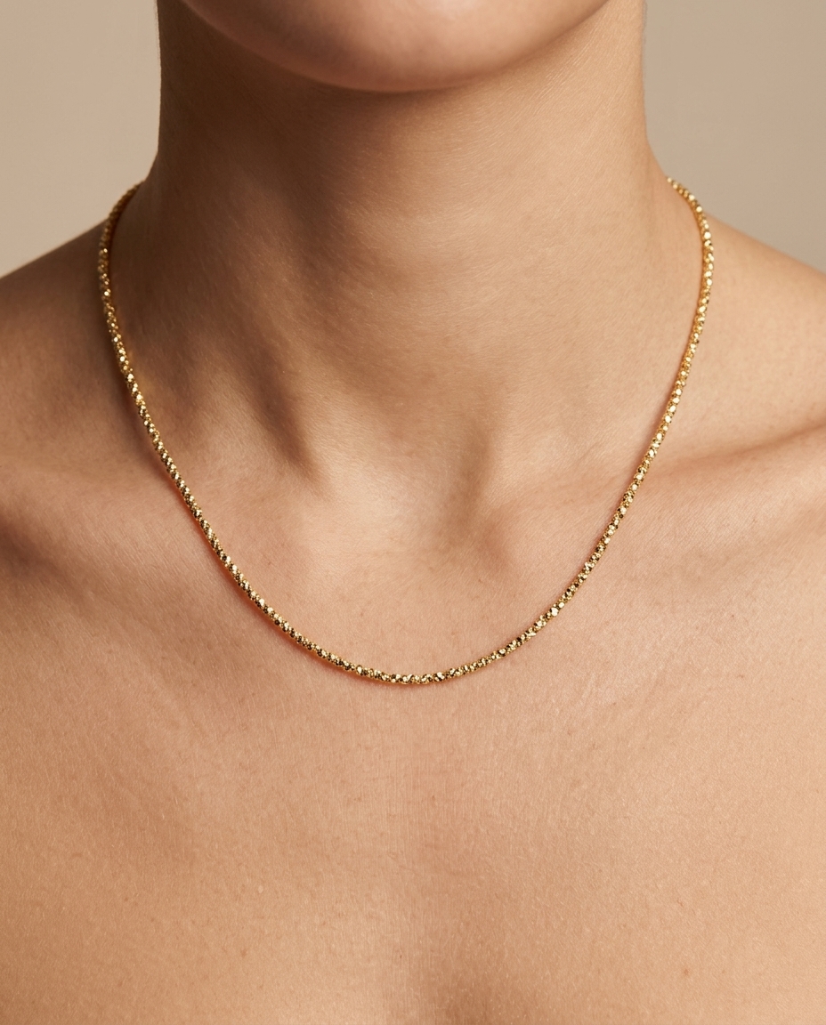 14KT Gold Diamond Cut Chain Necklace on model