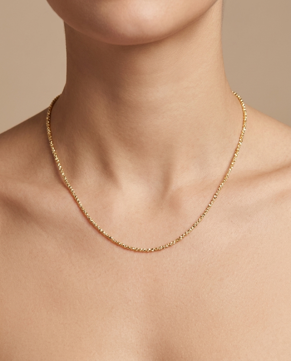 14KT Gold Diamond Cut Chain Necklace on model