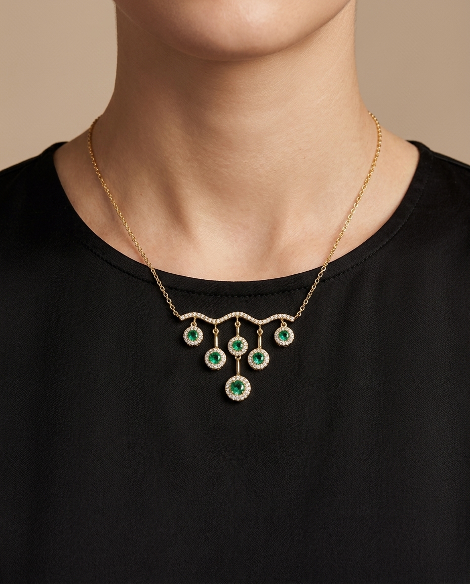 14KT Yellow Gold Emerald and Diamond Dangling Necklace on model