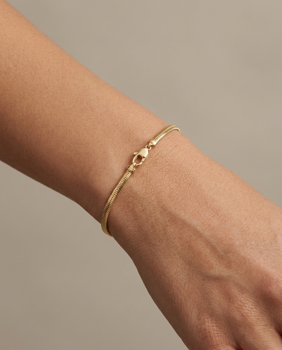 14KT Gold Flate Snake Bracelet on model