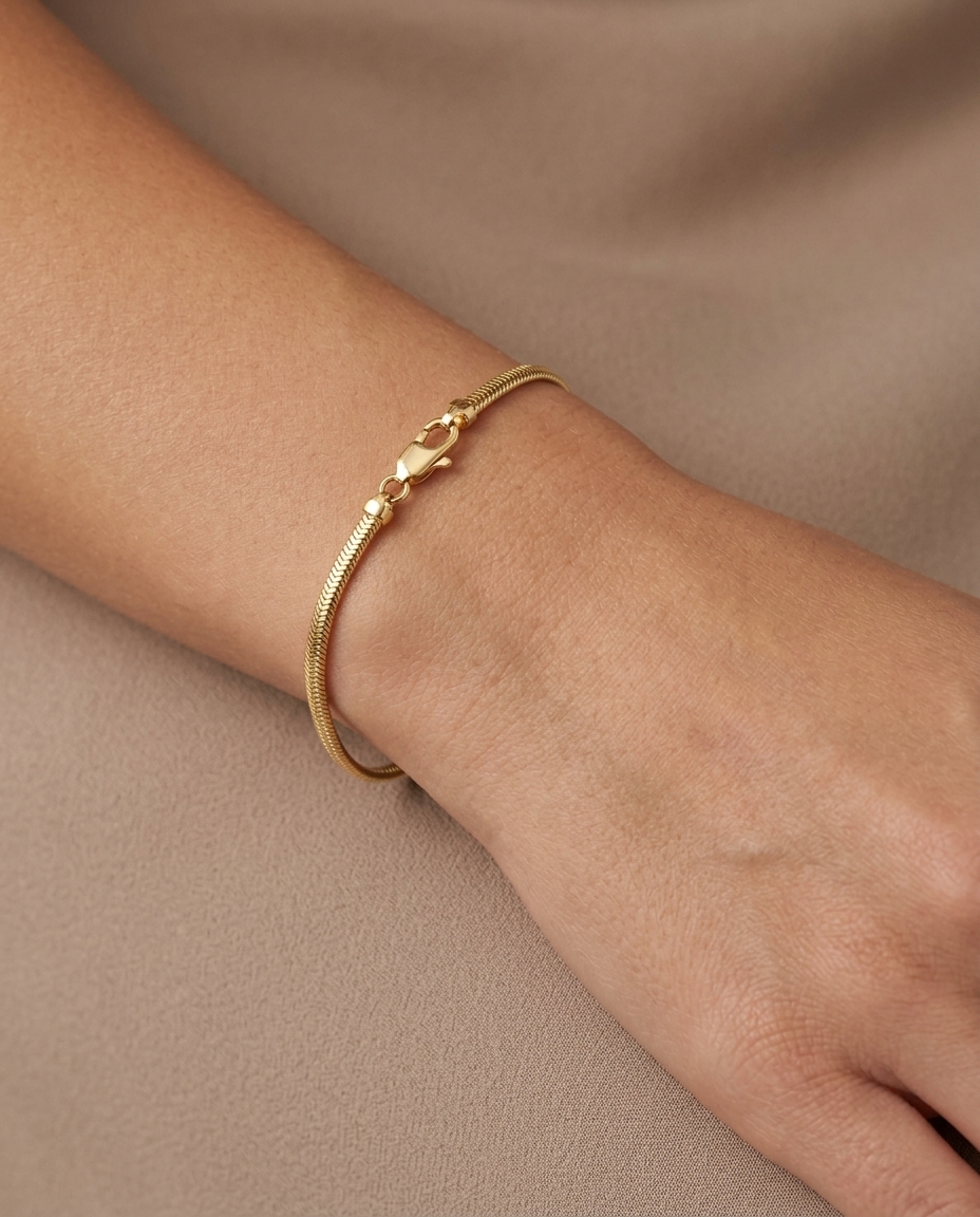 14KT Gold Flate Snake Bracelet on model