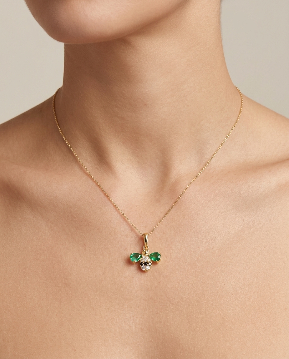 14KT Yellow Gold Emerald and Diamonds Bee Pendant on model